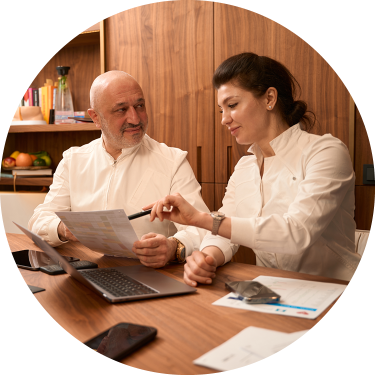 Two people working together on finances