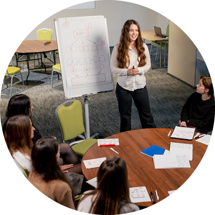A woman teaches a class
